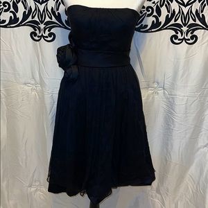 Solid black dress with bow.